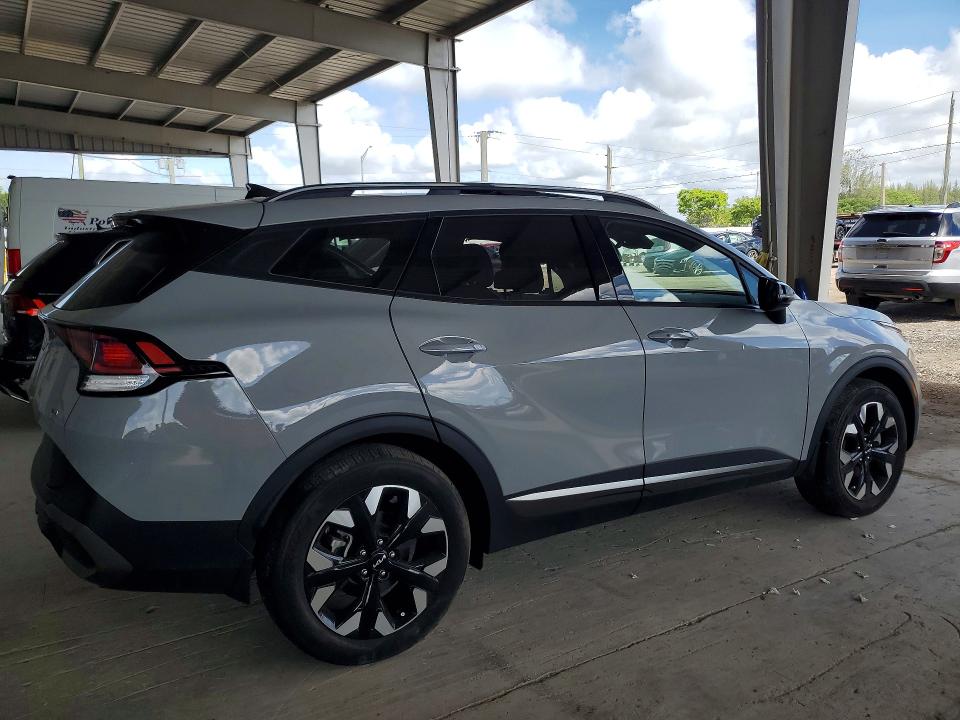 2024 Kia Sportage VIN 5XYK6CDF6RG189705 COPART salvage auction — SIDE, Fl - Cert Of Title Slvg Rebuildable, sold $4,850 on 2026-07-22 (photo 3)