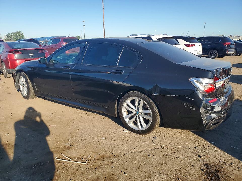 2016 BMW 7er VIN WBA7F2C59GG419706 COPART salvage auction — SIDE, Mi - Certificate Of Title, sold $2,000 on 2026-07-28 (photo 2)