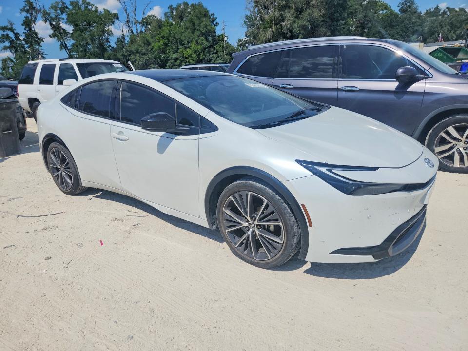 2023 Toyota Prius VIN JTDACAAU5P3011474 COPART salvage auction — MINOR DENT/SCRATCHES, LA - CERTIFICATE OF TITLE, sold $18,300 on 2026-07-23 (photo 4)
