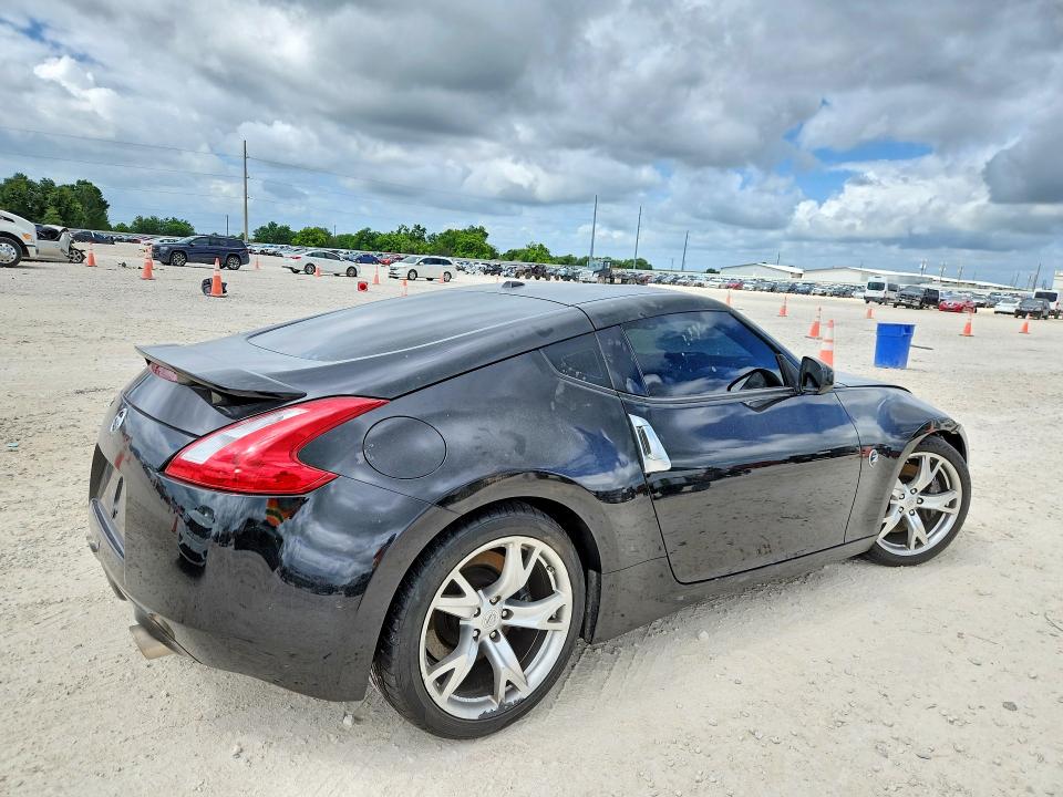 2009 Nissan 370z VIN JN1AZ44E79M405997 COPART salvage auction — SIDE, Tx - Salvage Vehicle Title, sold $2,200 on 2026-07-16 (photo 3)