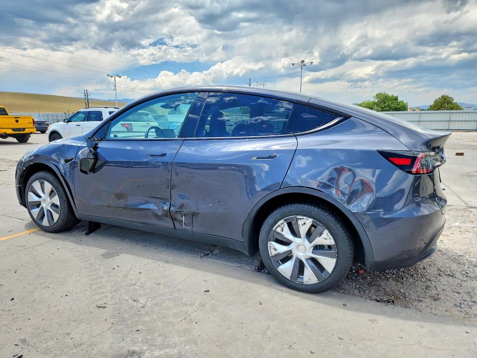 2023 Tesla Model y VIN 7SAYGDEE8PF935484 COPART salvage auction — SIDE, Co - Public - Salvage Title, sold $11,300 on 2026-09-04 (photo 2)