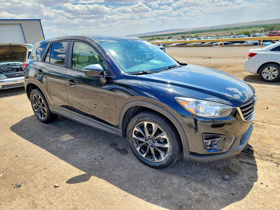 2016 Mazda VIN JM3KE4DY1G0748730 COPART salvage auction — VANDALISM, Nm - Cert Of Title-Salvage, sold $1,900 on 2026-07-30 (photo 4)