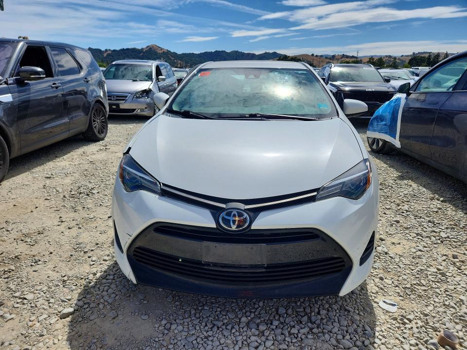 2019 Toyota Corolla VIN 5YFBURHE5KP941857 COPART salvage auction — SIDE, Ca - Salvage Certificate, sold $2,900 on 2026-07-14 (photo 5)