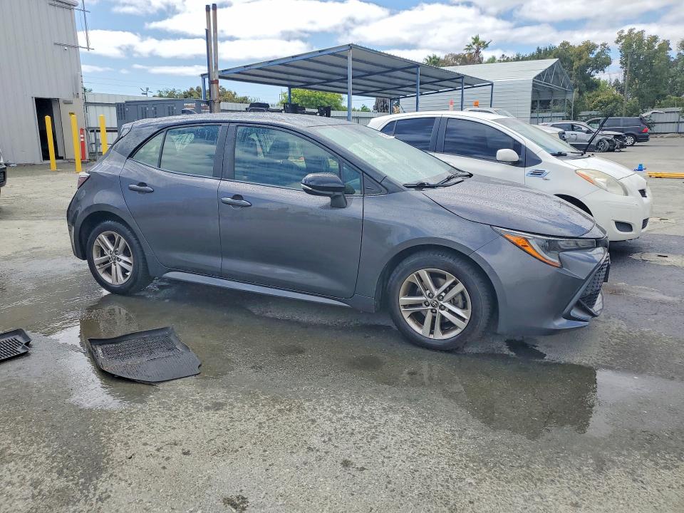 2021 Toyota Corolla VIN JTND4MBE5M3122424 COPART salvage auction — MINOR DENT/SCRATCHES, CA - CERTIFICATE OF TITLE, sold $2,600 on 2026-07-30 (photo 4)