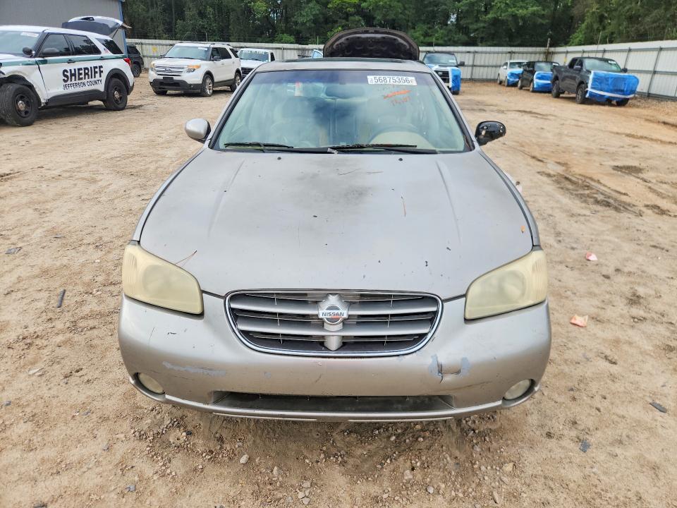 2001 Nissan Maxima VIN JN1CA31D61T818770 COPART salvage auction — SIDE, Fl - Cert Of Title Slvg Rebuildable, sold $300 on 2026-07-17 (photo 5)
