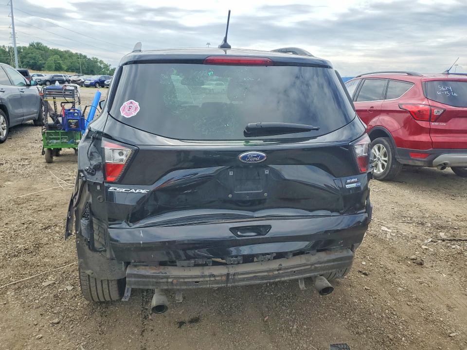 2018 Ford VIN 1FMCU9HD5JUB27359 COPART salvage auction — FRONT END, Mi - Certificate Of Title, sold $2,650 on 2026-07-02 (photo 6)