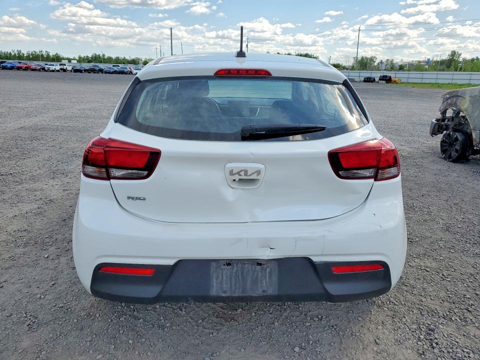 2023 Kia Rio VIN 3KPA25AD0PE521587 COPART salvage auction — FRONT END, QC - GRAVEMENT ACCIDENTE, sold $5,500 on 2026-07-02 (photo 6)