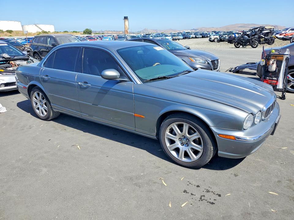2004 Jaguar Xj series VIN SAJWA71CX4SG21351 COPART salvage auction — VANDALISM, CA - SALVAGE CERTIFICATE, sold $350 on 2026-07-08 (photo 4)
