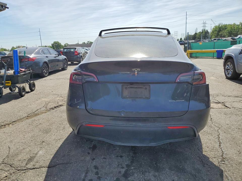 2024 Tesla VIN 7SAYGAEE8RF035542 COPART salvage auction — SIDE, Co - Public - Salvage Title, sold $11,000 on 2026-07-07 (photo 6)