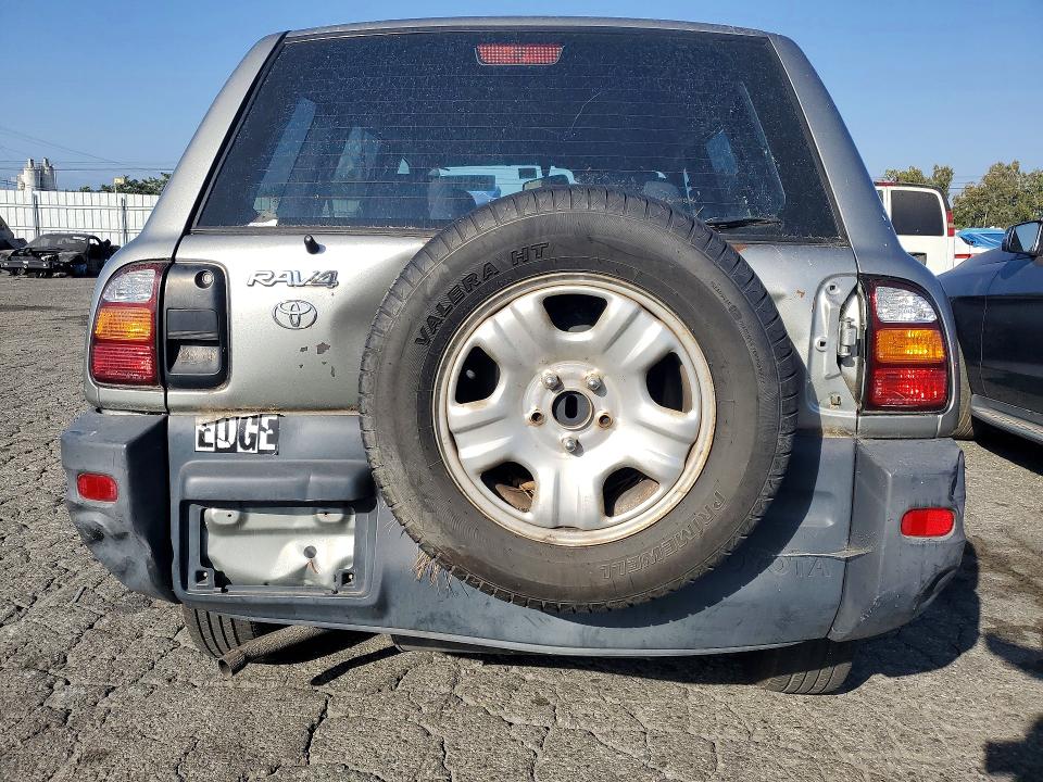 1999 Toyota Rav4 VIN JT3GP10V9X7057105 COPART salvage auction — REAR END, CA - DIS/DLR/EXP ONLY CLEAN TITLE, sold $200 on 2026-07-09 (photo 6)