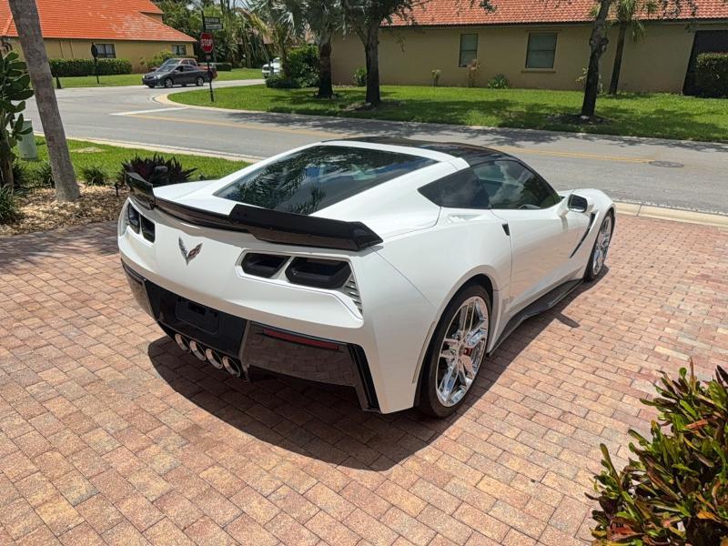 2016 Chevrolet Corvette stingray VIN 1G1YL2D71G5104192 COPART salvage auction — DAMAGE HISTORY, NC - SALVAGE CERT-REBUILT (P), sold $25,000 on 2026-07-31 (photo 4)