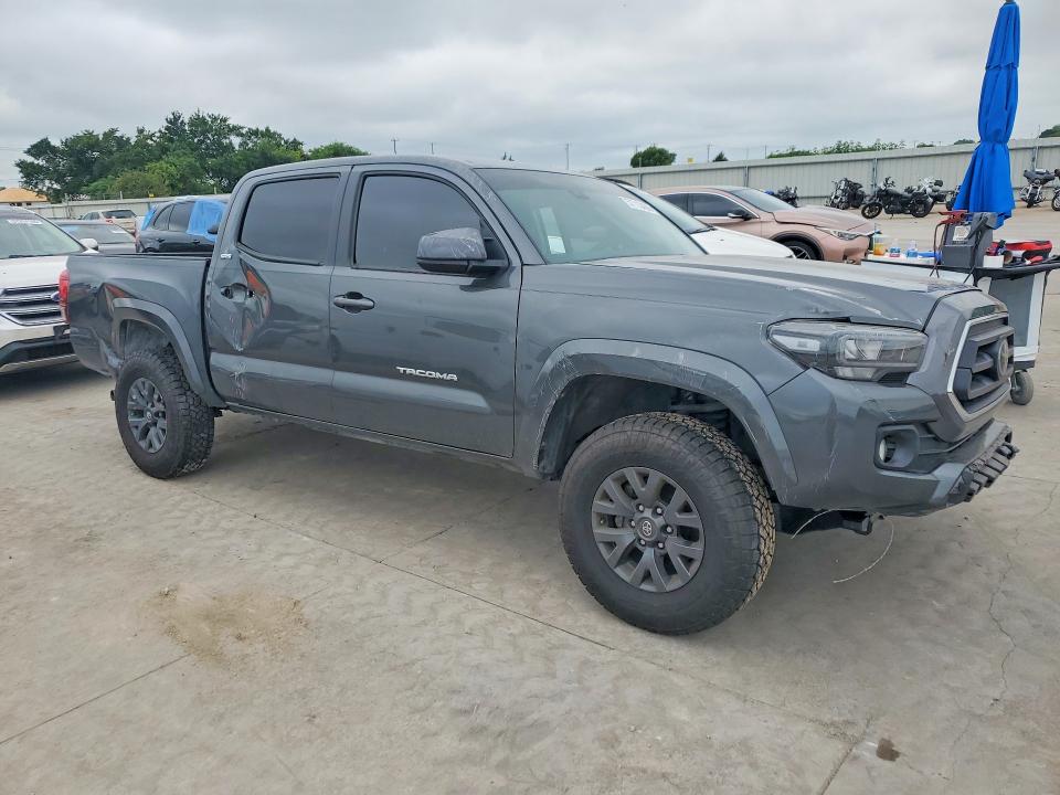 2023 Toyota Tacoma VIN 3TMAZ5CN1PM200858 COPART salvage auction — ROLLOVER, Tx - Salvage Vehicle Title, sold $9,400 on 2026-08-24 (photo 4)