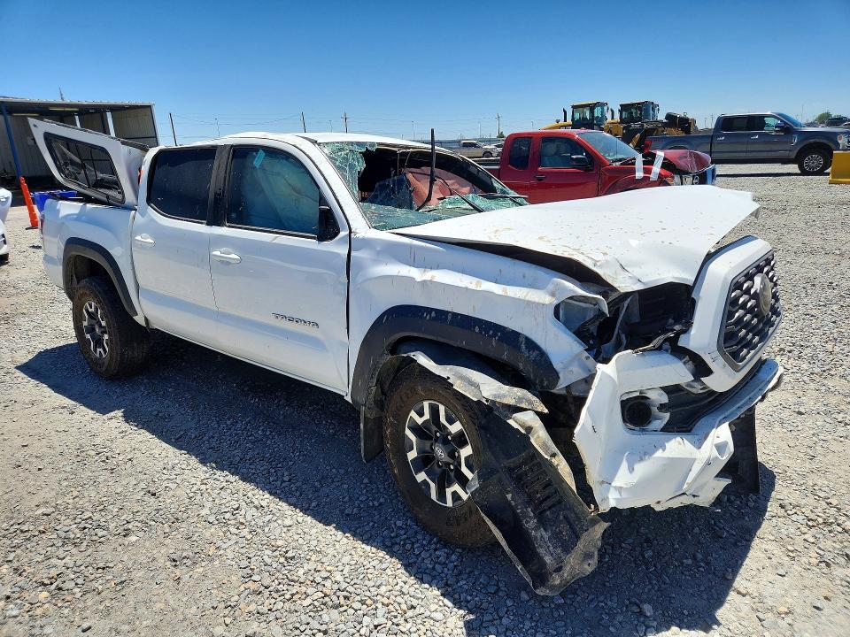 2023 Toyota Tacoma VIN 3TMCZ5AN8PM629166 COPART salvage auction — ROLLOVER, Co - Public - Salvage Title, sold $8,100 on 2026-07-02 (photo 4)