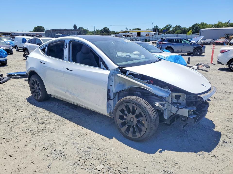 2022 Tesla Model y VIN 7SAYGAEE4NF433471 COPART salvage auction — REAR END, Ca - Salvage Certificate, sold $12,100 on 2026-07-07 (photo 4)