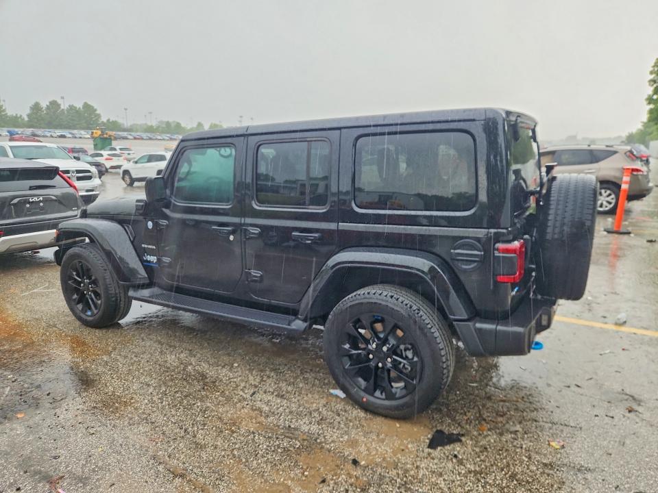 2023 Jeep Wrangler / VIN 1C4JJXP65PW557062 COPART salvage auction — MINOR DENT/SCRATCHES, MO - CERTIFICATE OF TITLE, sold $21,000 on 2026-07-09 (photo 2)