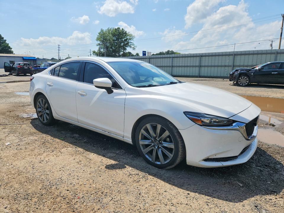 2018 Mazda VIN JM1GL1TY7J1301101 COPART salvage auction — WATER/FLOOD, La - Cert Of Title-Salvage Flood, sold $5,500 on 2026-07-09 (photo 4)