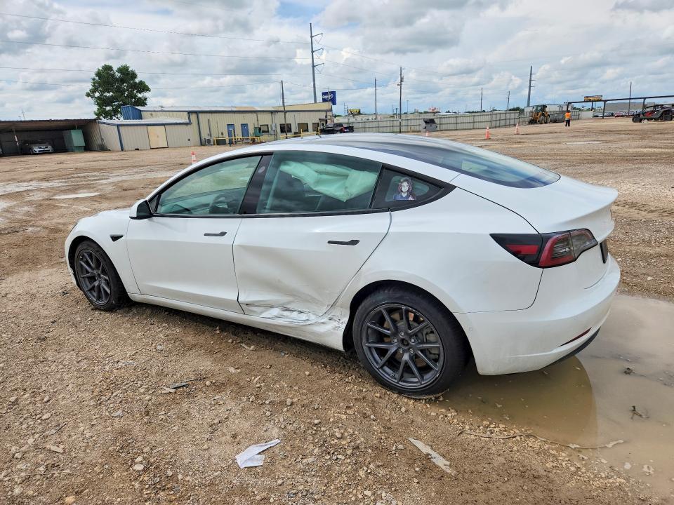 2022 Tesla Model 3 VIN 5YJ3E1EB1NF196263 COPART salvage auction — SIDE, TX - SALVAGE VEHICLE TITLE (P), sold $6,000 on 2026-07-29 (photo 2)