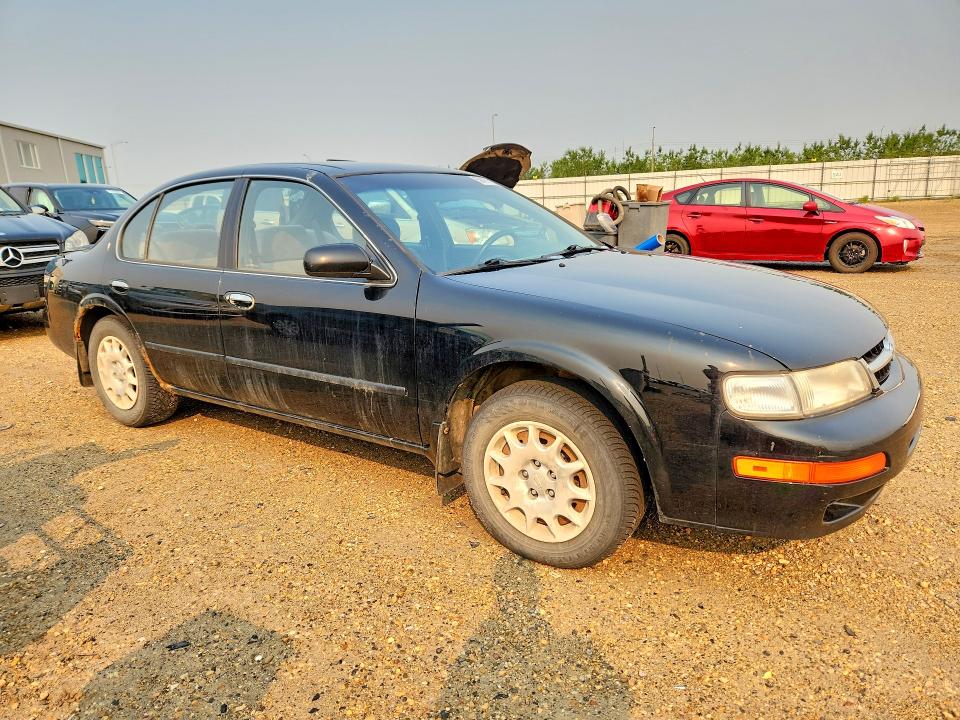 1998 Nissan Maxima VIN JN1CA21D0WT604844 COPART salvage auction — REAR END, AB - BOS - SALVAGE, sold $200 on 2026-07-16 (photo 4)