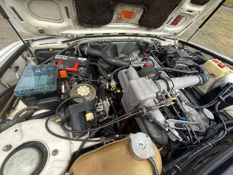1985 BMW 7 series VIN WBAFJ910608751757 COPART salvage auction — MINOR DENT/SCRATCHES, Or - Certificate Of Title (P), sold $5,800 on 2026-07-13 (photo 7)