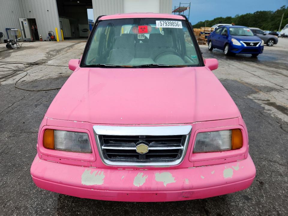 1998 Suzuki Sidekick VIN JS3TD21V3W4109675 COPART salvage auction — HAIL, Mo - Salvage Certificate Of Title, sold $300 on 2026-07-20 (photo 5)