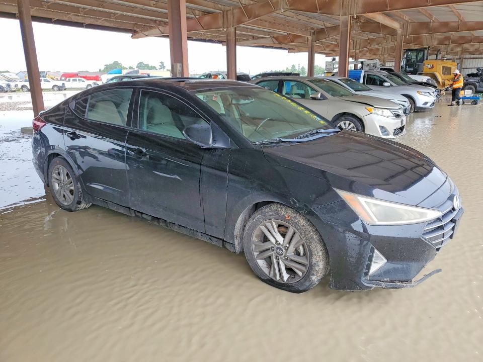 2019 Hyundai Elantra VIN KMHD84LFGKU808068 COPART salvage auction — WATER/FLOOD, Tx - Salvage Title-Flood Damage, sold $975 on 2026-07-17 (photo 4)