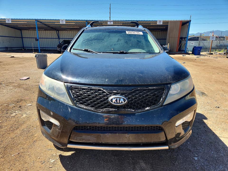 2012 Kia Sorento VIN 5XYKWDA23CG308986 COPART salvage auction — HAIL, Co - Dis/Dlr/Exp Only Clean Title, sold $1,300 on 2026-07-27 (photo 5)