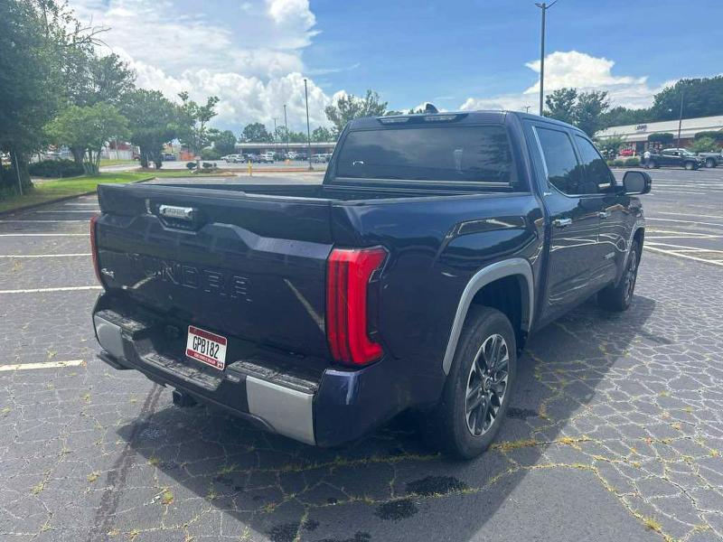 2023 Toyota Tundra VIN 5TFJC5DB2PX036925 COPART salvage auction — NORMAL WEAR, Tx - Certificate Of Title (P), sold $22,400 on 2026-07-20 (photo 4)