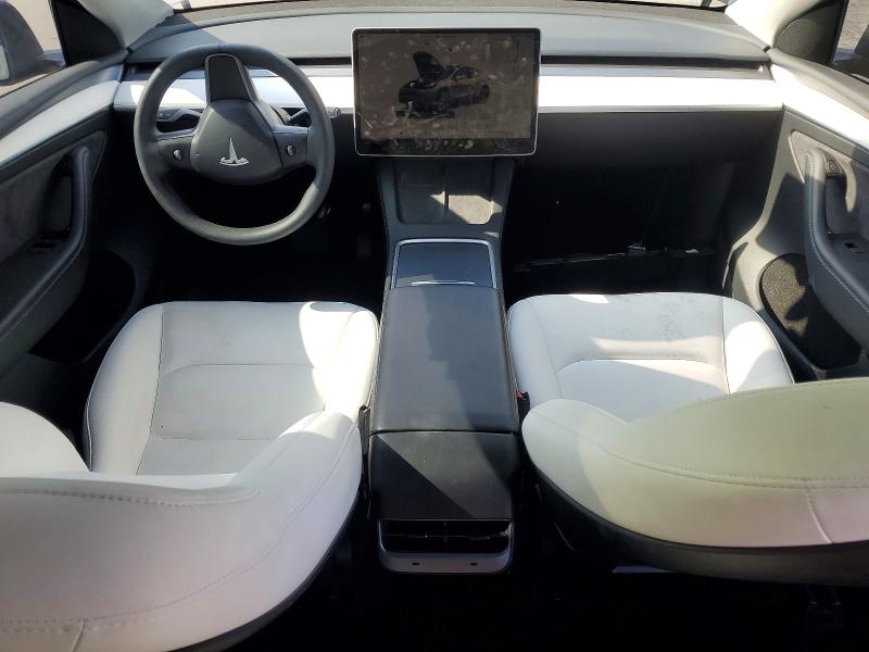 2023 Tesla Model y VIN 7SAYGDEE0PF925676 COPART salvage auction — FRONT END, Ca - Salvage Certificate, sold $9,400 on 2026-07-02 (photo 8)