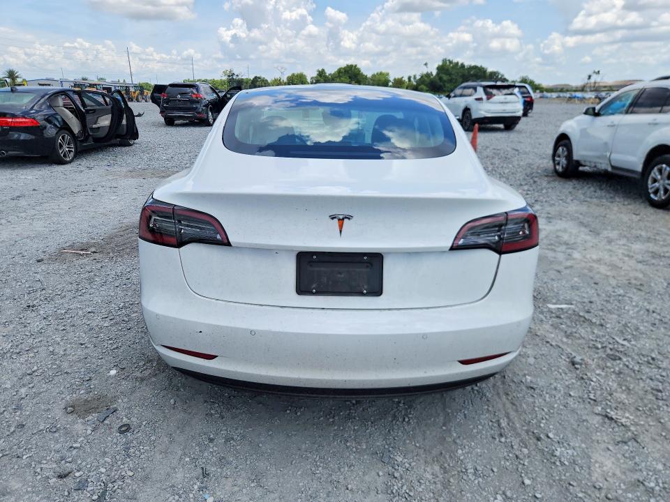 2021 Tesla VIN 5YJ3E1EA2MF053358 COPART salvage auction — FRONT END, FL - CERT OF TITLE SLVG REBUILDABLE, sold $1,450 on 2026-07-24 (photo 6)