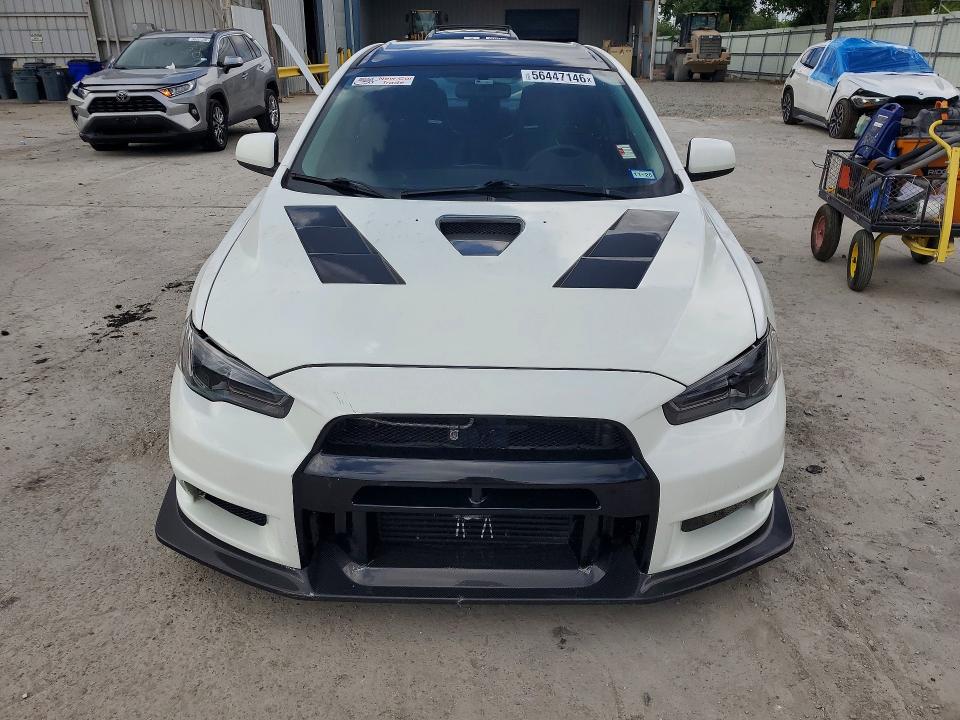 2014 Mitsubishi Lancer evolution VIN JA32W8FVXEU021204 COPART salvage auction — MECHANICAL, Tx - Certificate Of Title (P), sold $14,500 on 2026-07-28 (photo 5)