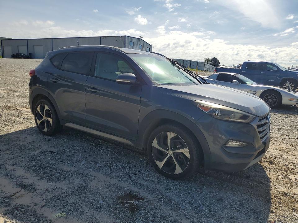 2017 Hyundai Tucson VIN KM8J3CA25HU335980 COPART salvage auction — MECHANICAL, MT - CERTIFICATE OF TITLE, sold $1,900 on 2026-07-22 (photo 4)
