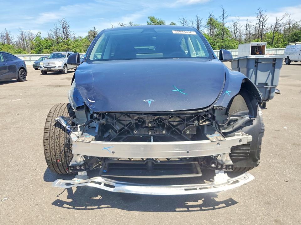 2024 Tesla Model y VIN 7SAYGDEE9RA253620 COPART salvage auction — FRONT END, NY - MV907A W/UNSATISFIED LIEN, sold $13,800 on 2026-07-13 (photo 5)