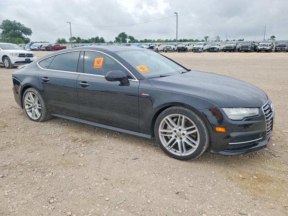2016 Audi A7 VIN WAUWGAFC3GN011646 COPART salvage auction — WATER/FLOOD, Tx - Salvage Title-Flood Damage, sold $150 on 2026-07-22 (photo 4)
