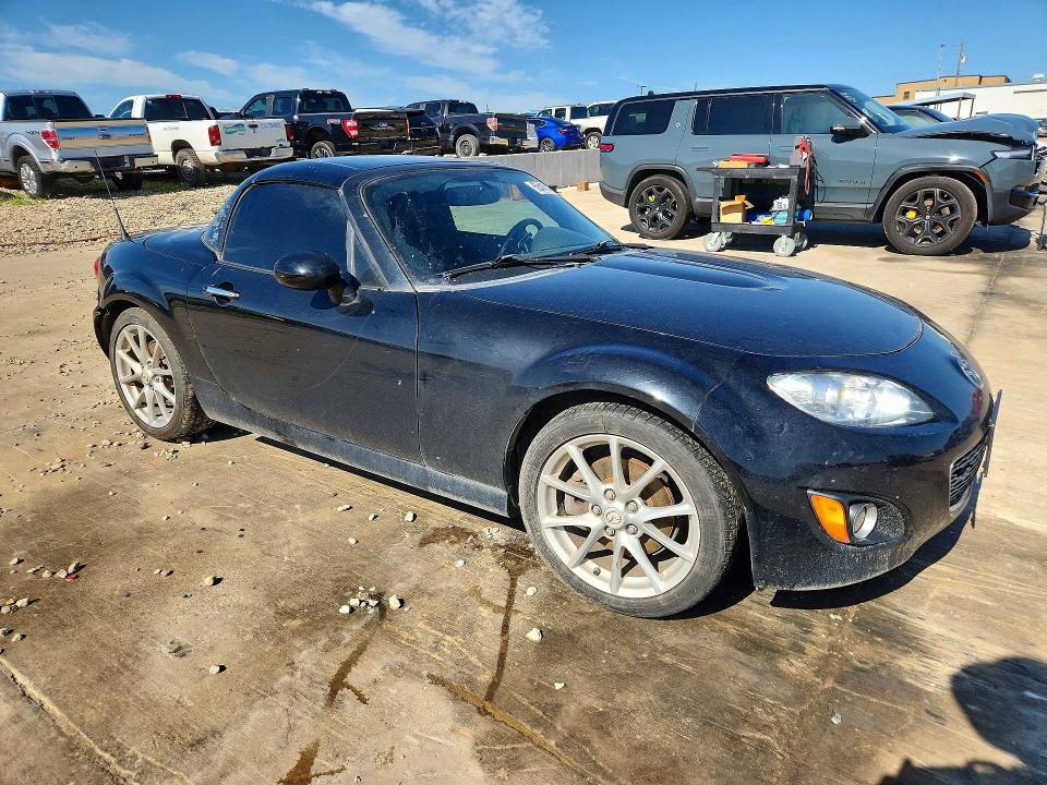 2010 Mazda Mx-5 miata VIN JM1NC2FF9A0213034 COPART salvage auction — SIDE, Tx - Salvage Vehicle Title, sold $1,150 on 2026-07-23 (photo 4)