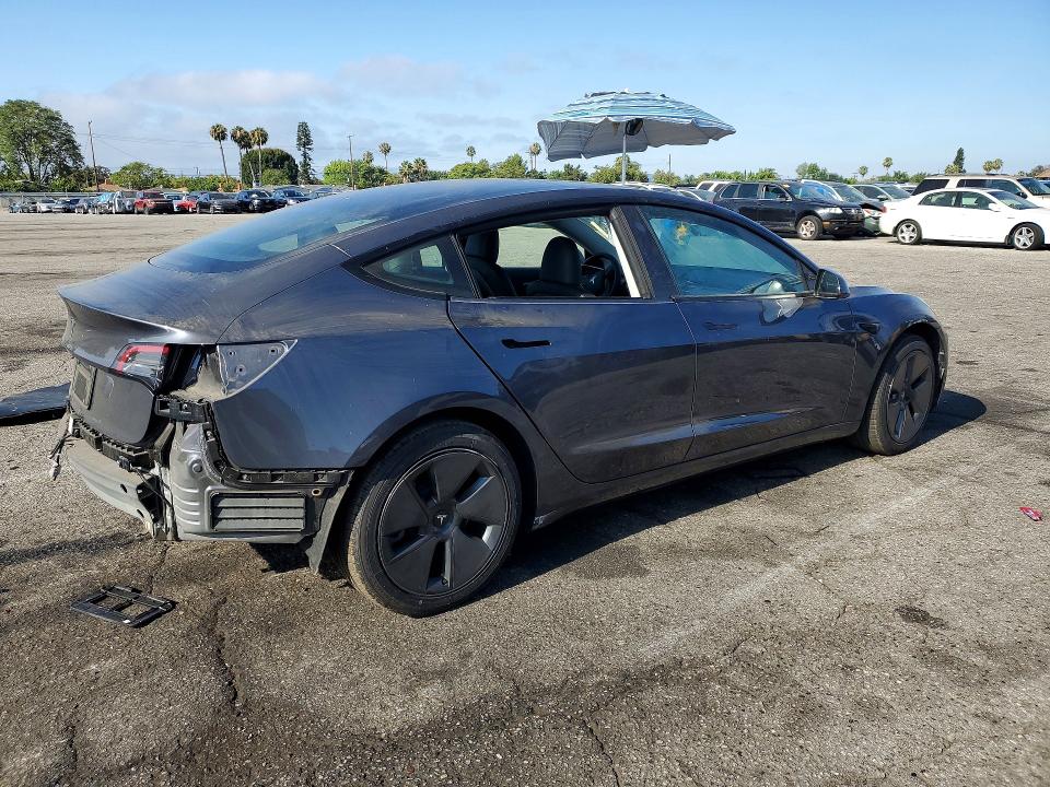 2023 Tesla VIN 5YJ3E1EA0PF581632 COPART salvage auction — REAR END, Ca - Salvage Certificate, sold $5,500 on 2026-07-28 (photo 3)