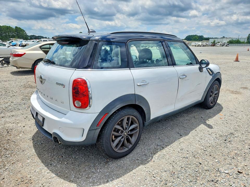 2014 Mini Cooper VIN WMWZC3C5XEWP28899 COPART salvage auction — SIDE, Nc - Salvage Certificate Of Title, sold $1,600 on 2026-08-17 (photo 3)