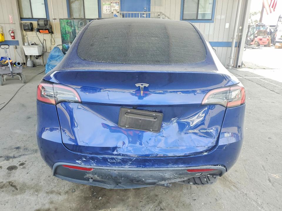 2024 Tesla Model y VIN 7SAYGDEE1RF064947 COPART salvage auction — REAR END, CA - SALVAGE CERTIFICATE, sold $15,200 on 2026-07-23 (photo 6)