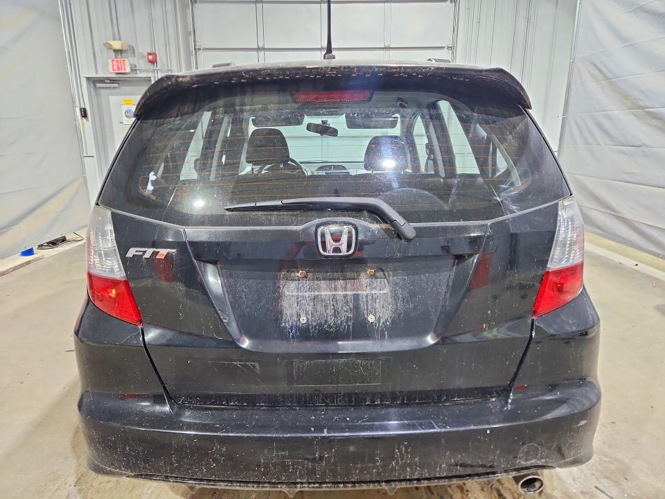 2009 Honda Fit VIN JHMGE88499S019216 COPART salvage auction — SIDE, Me - Certificate Of Title, sold $900 on 2026-07-04 (photo 6)