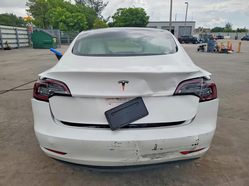 2021 Tesla Model 3 VIN 5YJ3E1EA7MF973146 COPART salvage auction — REAR END, Fl - Cert Of Title Slvg Rebuildable, sold $7,900 on 2026-07-15 (photo 6)