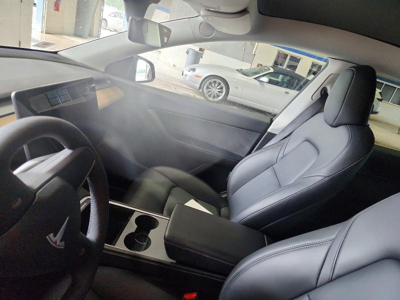 2022 Tesla Model y VIN 7SAYGDEE9NA005510 COPART salvage auction — NORMAL WEAR, Va - Cert Of Title - Salvage, sold $2,550 on 2026-07-24 (photo 8)