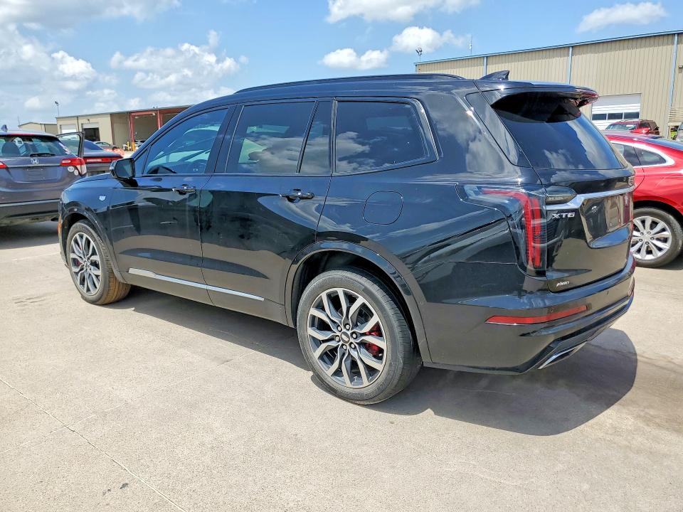 2023 Cadillac Xt6 VIN 1GYKPGRS0PZ141748 COPART salvage auction — WATER/FLOOD, Salvage Title, sold $9,000 on 2026-07-30 (photo 2)