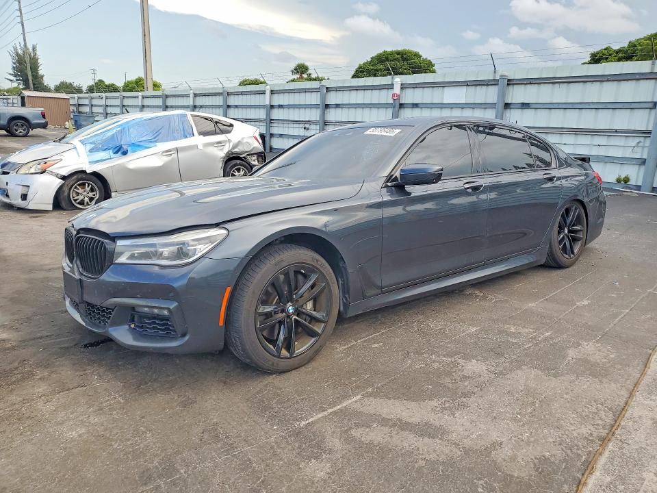 2016 BMW 7er VIN WBA7F2C52GG418655 COPART salvage auction — SIDE, Fl - Cert Of Title Slvg Rebuildable, sold $5,000 on 2026-07-08 (photo 1)