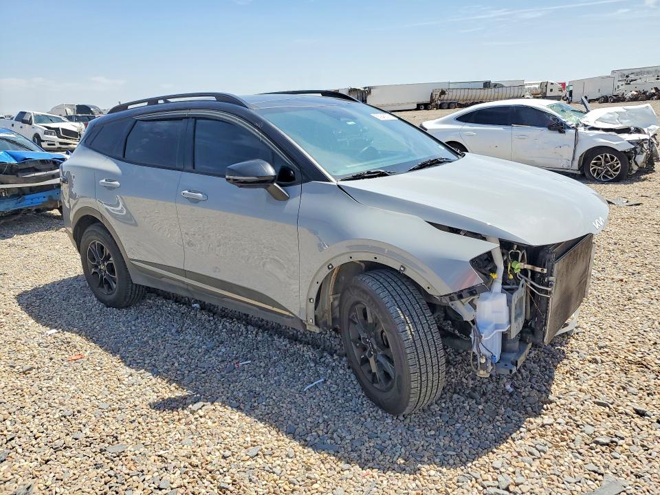 2023 Kia Sportage VIN 5XYK7CAF7PG007928 COPART salvage auction — FRONT END, TX - SALVAGE VEHICLE TITLE, sold $5,600 on 2026-08-20 (photo 4)