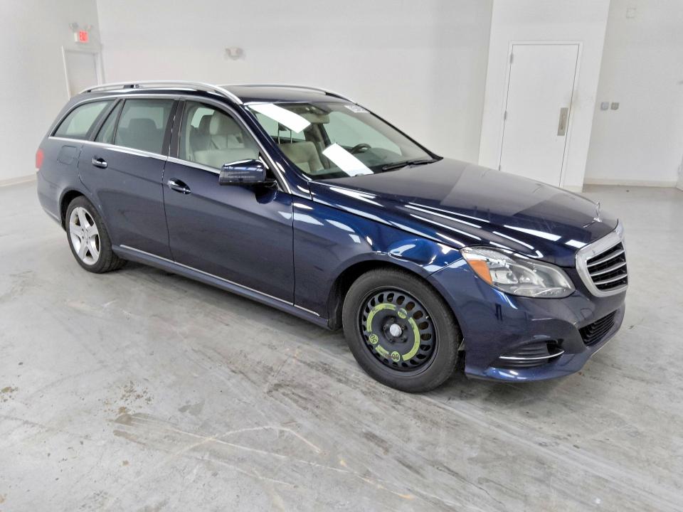 2014 Mercedes-benz E-class VIN WDDHH8JB8EB025501 COPART salvage auction — NORMAL WEAR, Wv - Certificate Of Title, sold $2,900 on 2026-07-09 (photo 4)