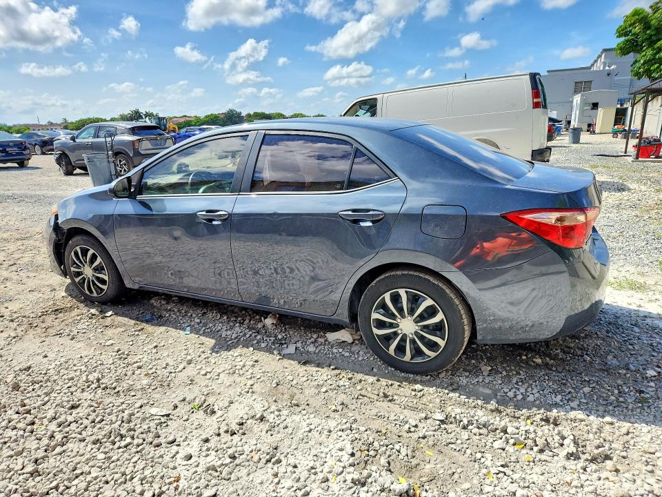 2017 Toyota Corolla VIN 5YFBURHE9HP703339 COPART salvage auction — SIDE, Fl - Cert Of Title Slvg Rebuildable, sold $3,750 on 2026-07-10 (photo 2)