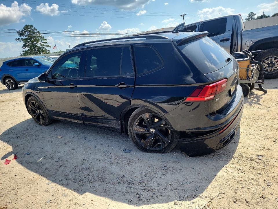 2023 Volkswagen Tiguan VIN 3VVCB7AX2PM075951 COPART salvage auction — SIDE, Salvage Title, sold $8,300 on 2026-08-27 (photo 2)