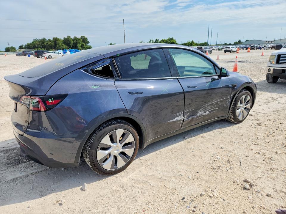 2023 Tesla VIN 7SAYGDED5PF958132 COPART salvage auction — SIDE, Tx - Salvage Vehicle Title, sold $2,000 on 2026-07-30 (photo 3)