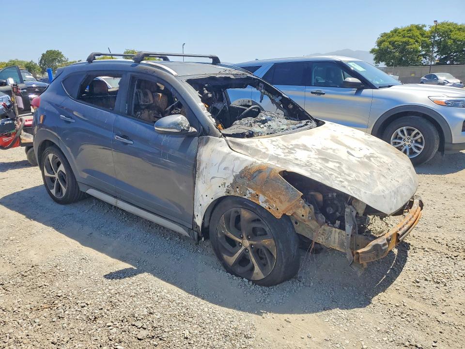 2017 Hyundai Tucson VIN KM8J33A20HU387744 COPART salvage auction — BURN, CA - NON-REPAIRABLE VEHICLE CERT, sold $175 on 2026-07-10 (photo 4)