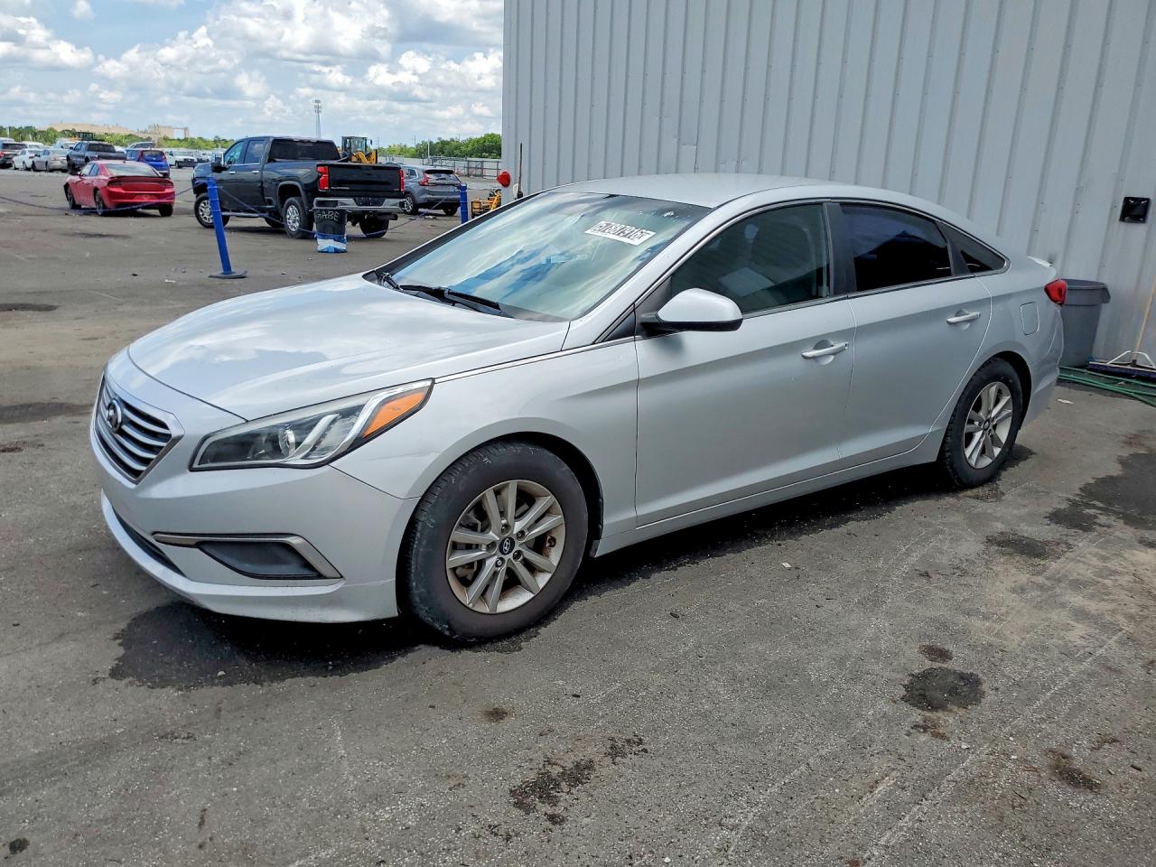 2016 Hyundai Sonata VIN 5NPE24AF4GH267374 COPART salvage auction — Minor Dent/Scratches, FL - CERTIFICATE OF TITLE, sold $1,000 on 2026-07-09 (photo 1)
