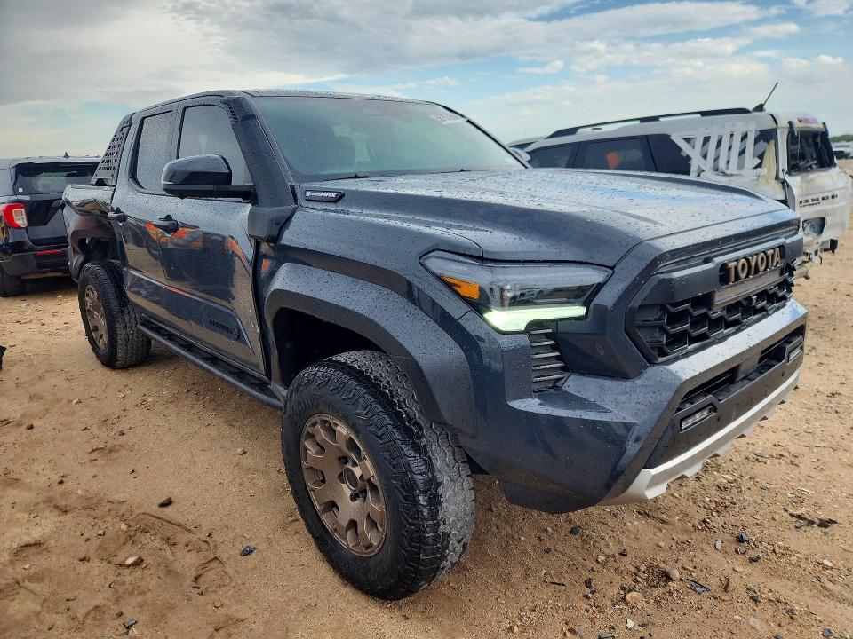 2025 Toyota Tacoma VIN 3TYLC5LN6ST043657 COPART salvage auction — SIDE, Tx - Salvage Vehicle Title, sold $50,000 on 2026-07-30 (photo 4)